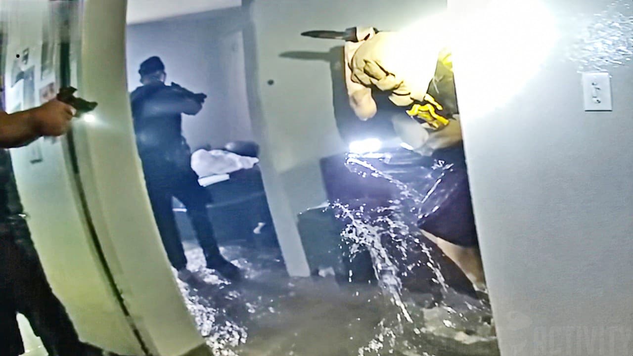 Thumbnail for Barricaded Suspect Sets Apartment Ablaze Then Charges Police With Knife
