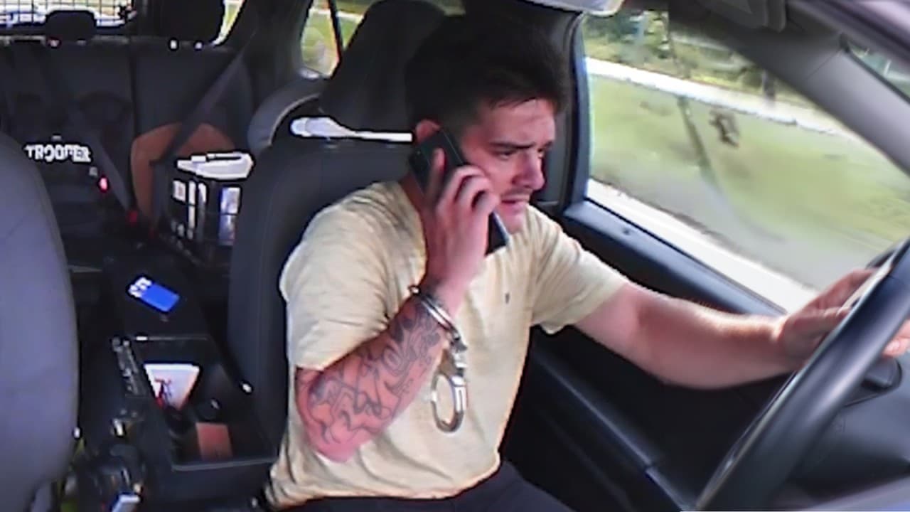 Thumbnail for Man Calls Girlfriend After Stealing Police Car